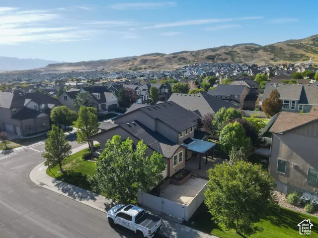 Elegant home situated on a corner lot with mature landscaping and established trees