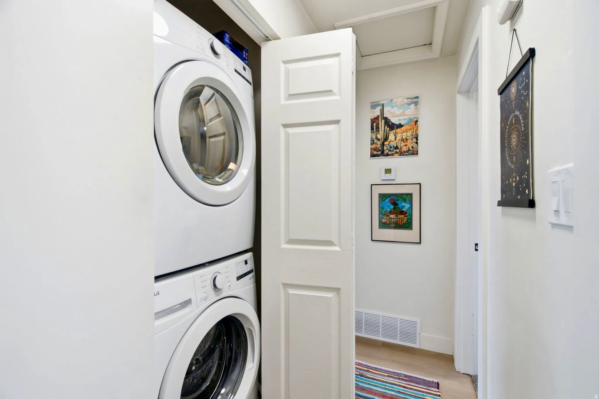 Stacked washer and dryer units