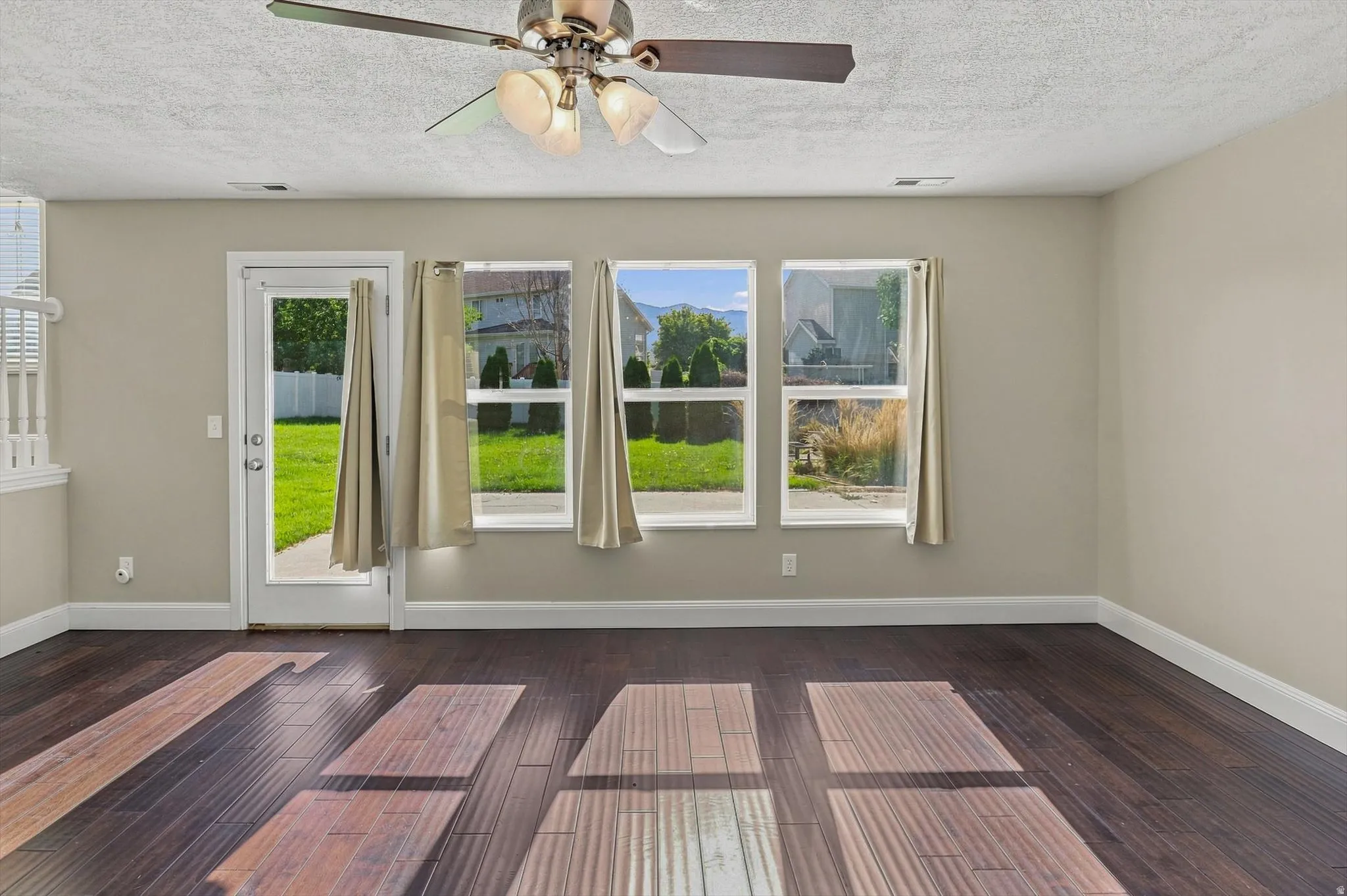 Wood-finish flooring with a neutral wall color