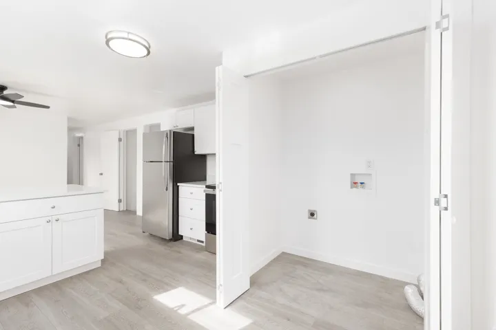 Main floor kitchen with laundry room