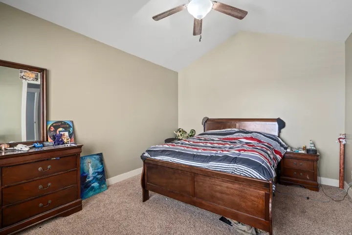 Vaulted ceiling with an attached ceiling fan
