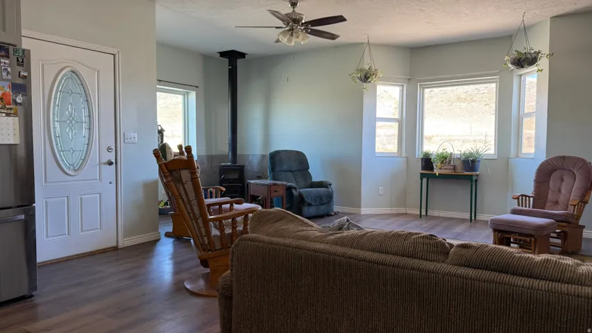 Wood-finish flooring throughout, complemented by light-toned wall paint