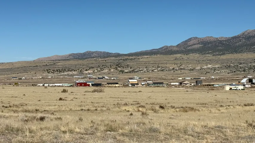 Expansive desert landscape with distant mountains