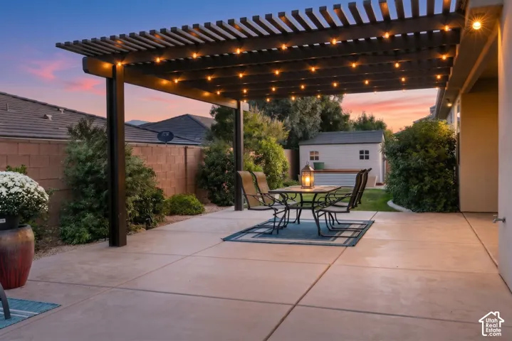 Patio: Covered patio opening to the pergola and lawn