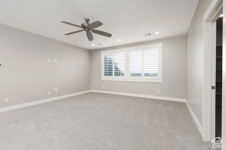 Loft: Shown vacant, with new carpet and the storage closet door at right