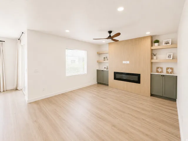 Wood-finish flooring, recessed lighting, and a modern ceiling fan