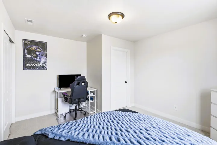 Bedroom #3Recessed ceiling lighting complements the overhead light fixture