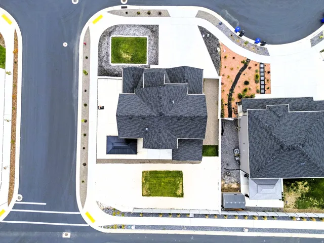 Birds Eye view of house and fully landscaped lot.