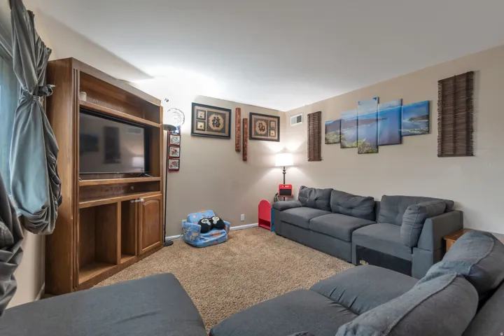 Built-in media center with wood-finish cabinetry