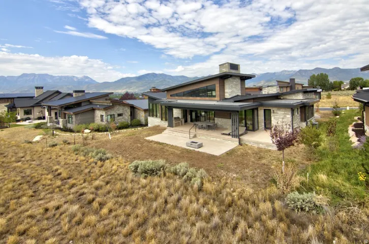 Contemporary architecture with stone and wood-look siding