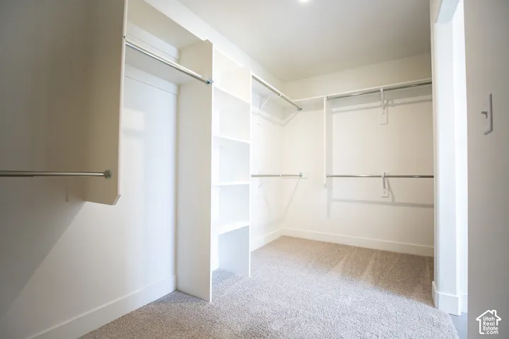 Huge walk-in closet as part of primary suite.