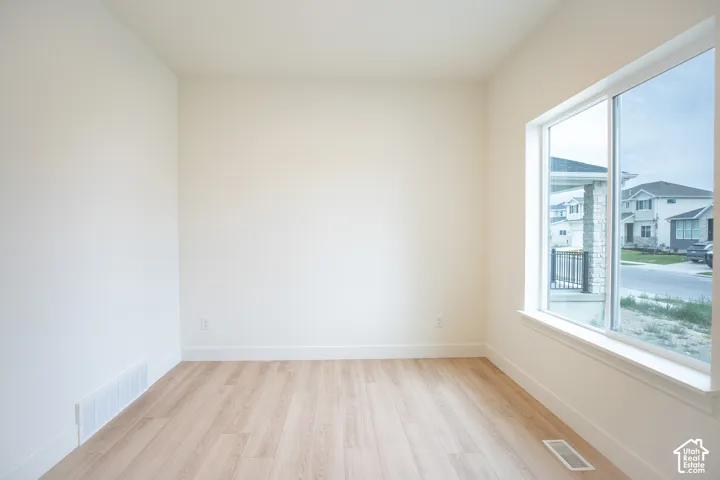 Living room/office adjacent to front entry.
