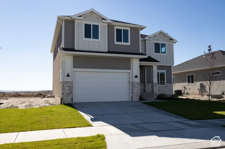 Redwood Elevation B with front yard landscaping installed.