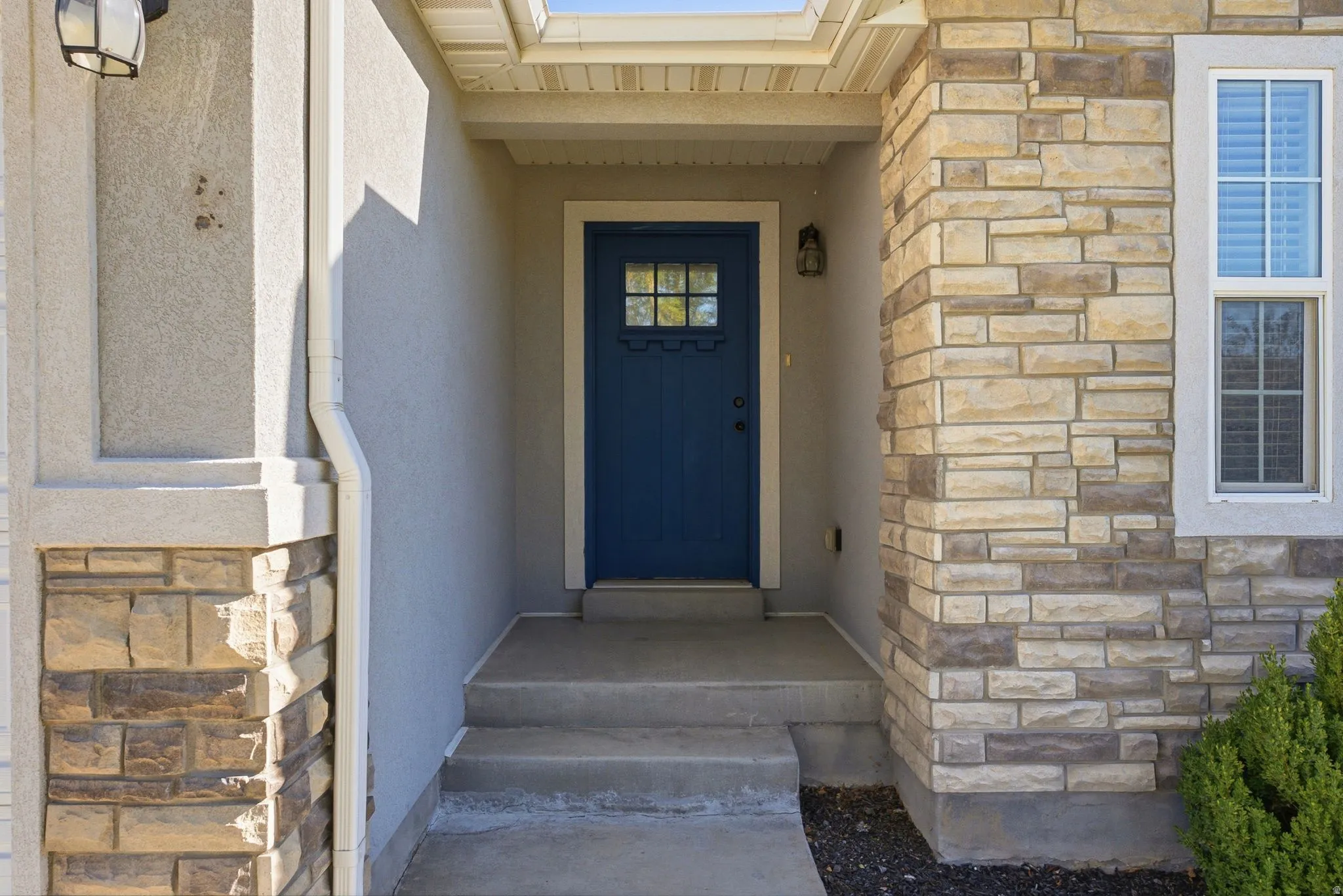 Stone veneer and stucco exterior