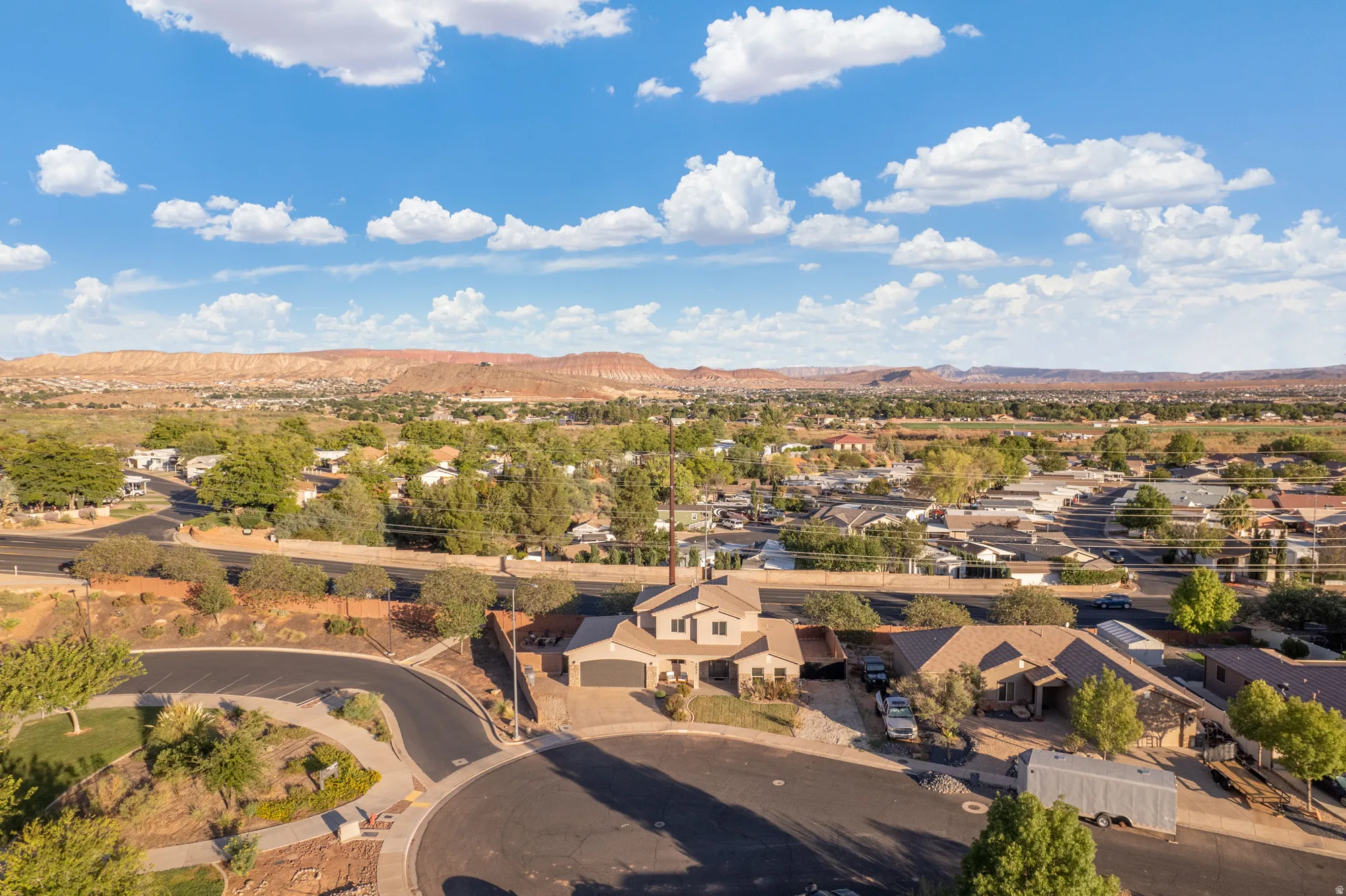 Cul-de-sac location with a multi-level residence, two-car garage, and mature landscaping