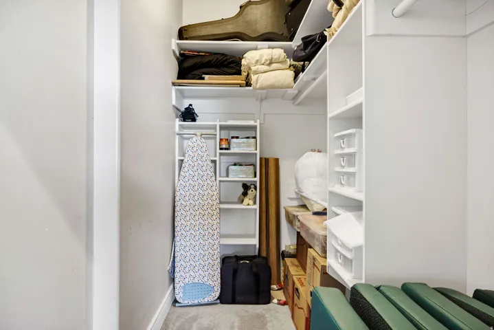 Custom built-in shelving provides ample storage