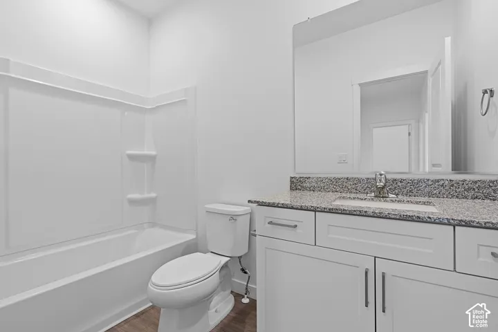 White vanity cabinetry with brushed nickel hardware