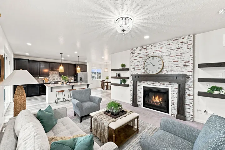 Fireplace with a wood mantle and brick-finish surround