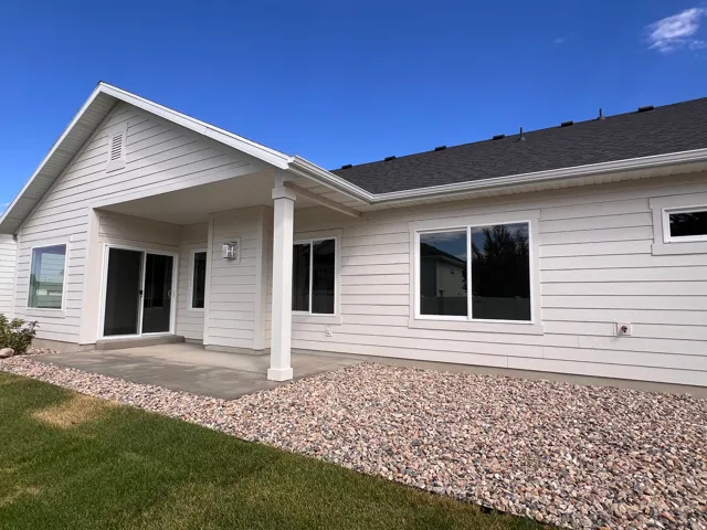 Covered patio with sliding glass door access
