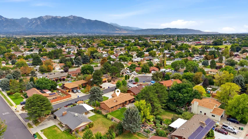 Established residential neighborhood featuring tree-lined streets, mature landscaping, and single-family homes with varied architectural styles