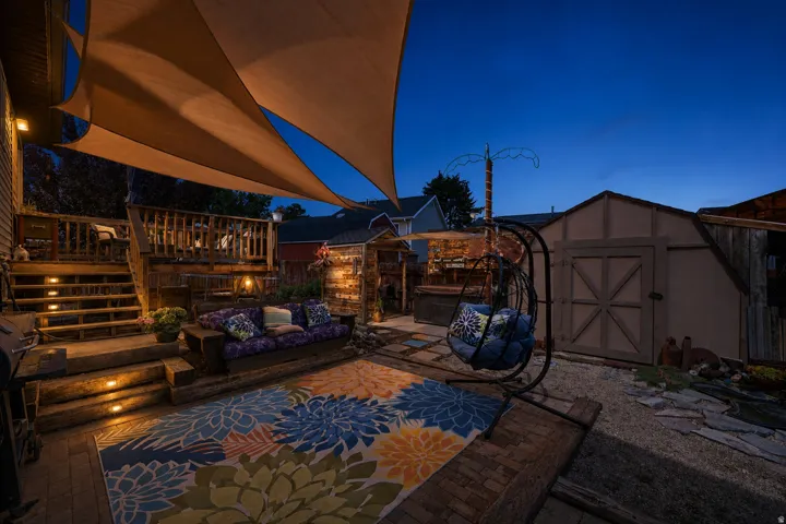 Multi-level wood deck featuring integrated step lighting