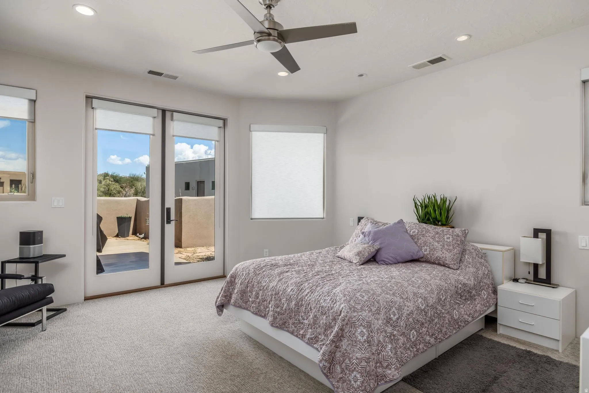 Primary Bedroom, Recessed lighting, ceiling fan, and French doors with privacy shades