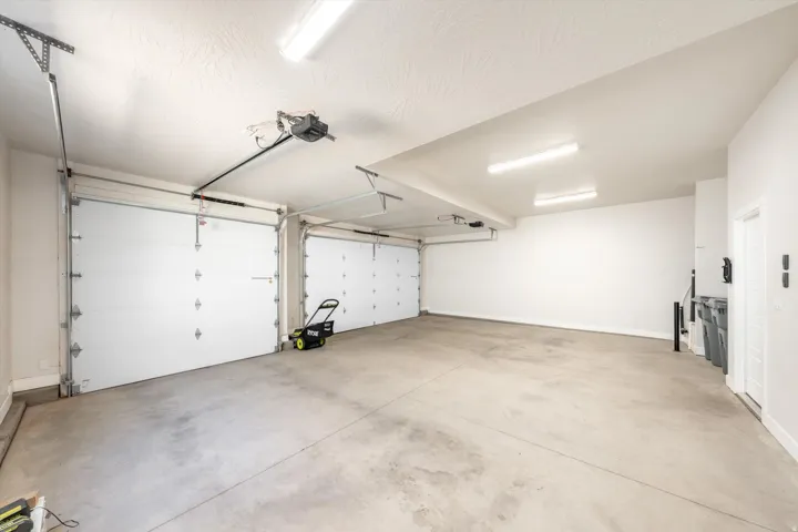 Two overhead garage doors with automatic openers