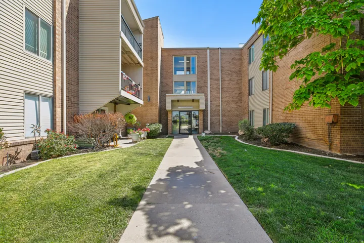 Multi-story building with brick and siding exterior