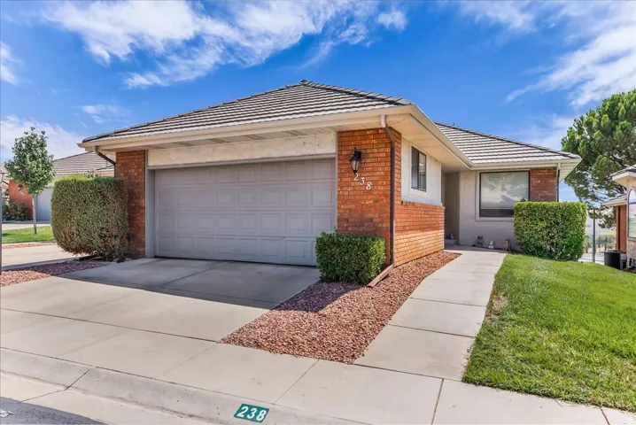 Brick exterior accents with a stucco finish