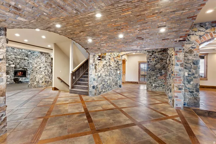 Stone and brick archways with recessed lighting