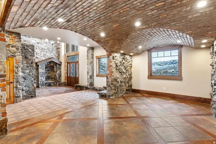 Arched brick ceiling with recessed lighting