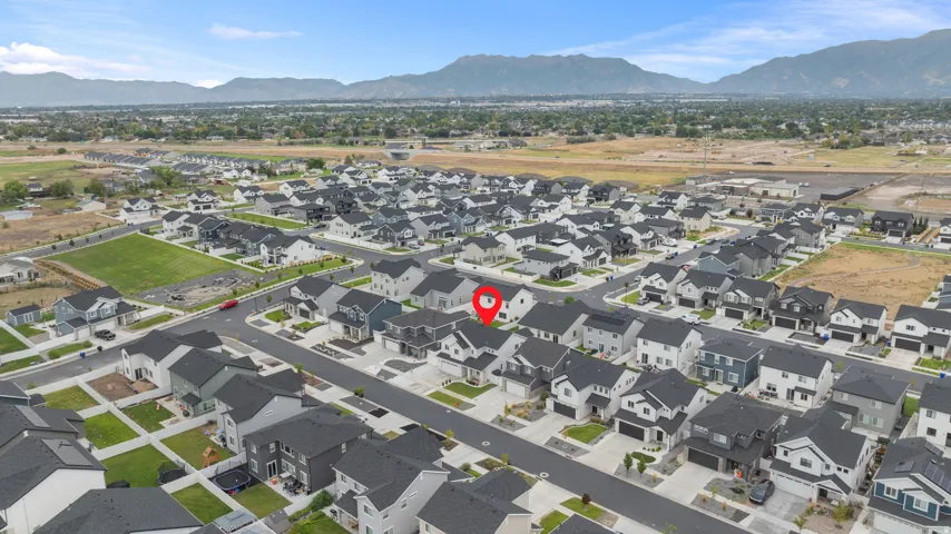 Aerial perspective showcasing a developed residential community with uniform architectural styles