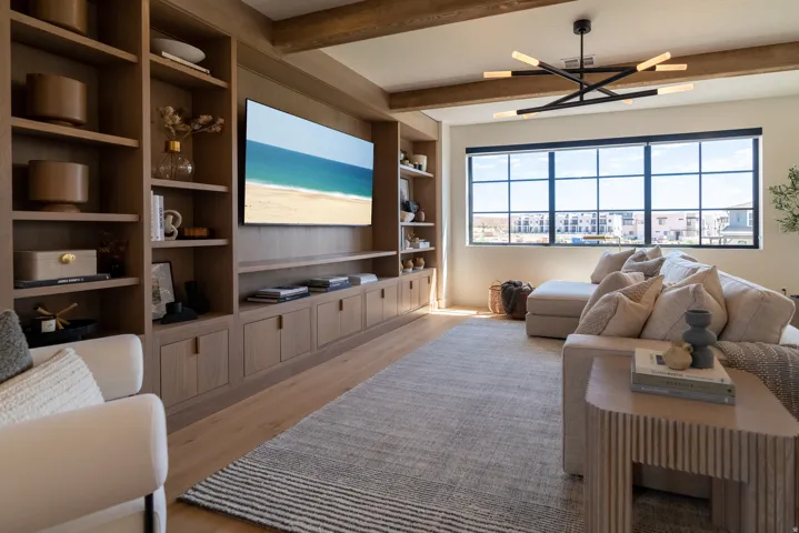Custom built-in media center with shelving and lower cabinetry