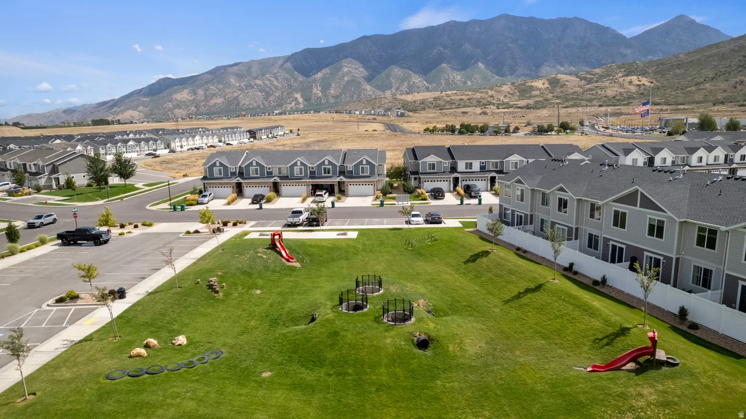 Manicured green spaces with integrated recreational elements