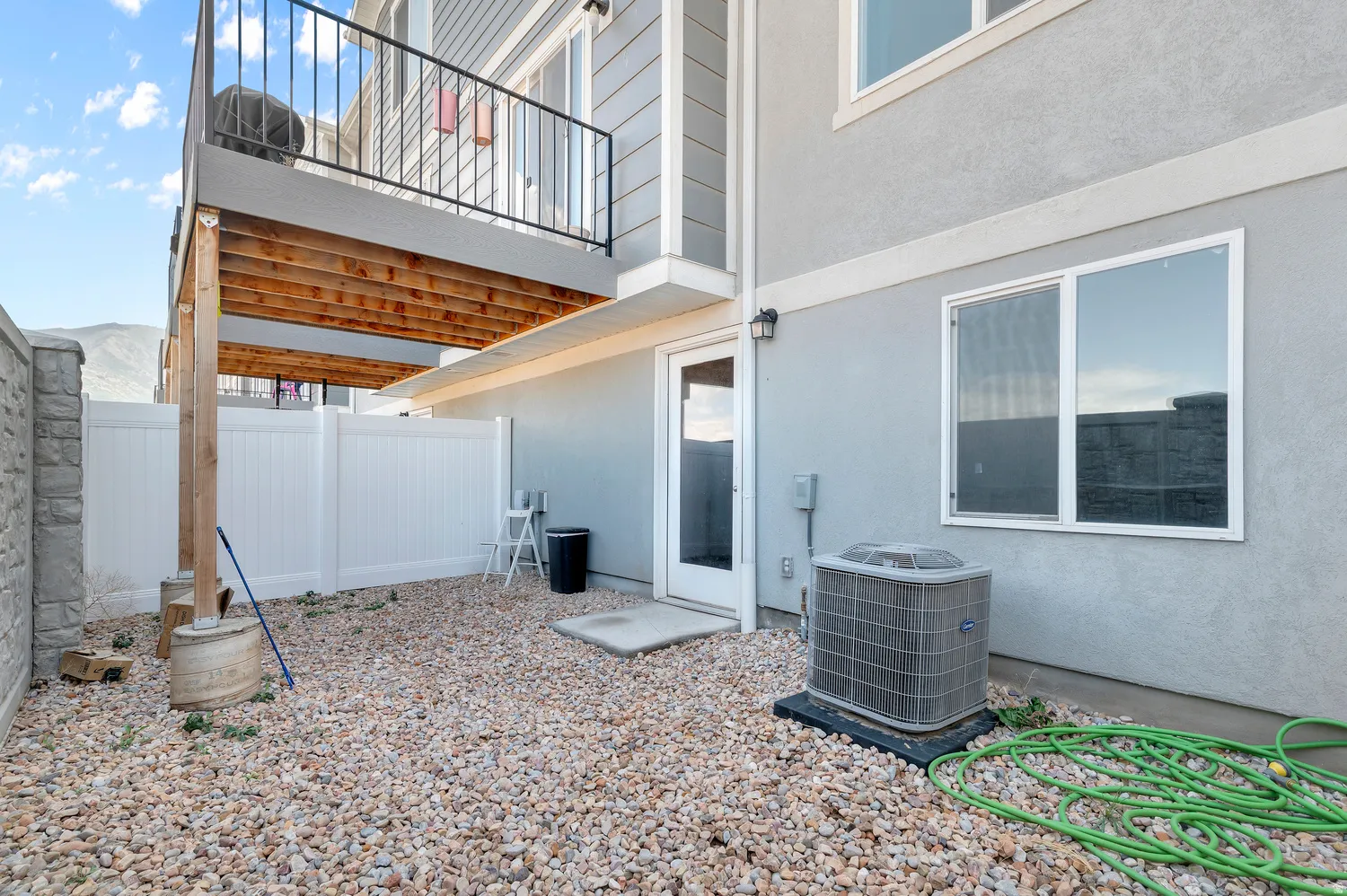 Full Daylight and Walk-out basement, Upper-level balcony with metal railings