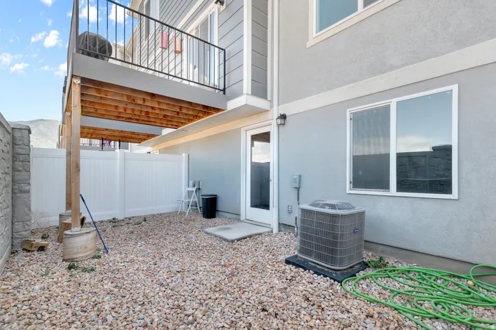 Full Daylight and Walk-out basement, Upper-level balcony with metal railings