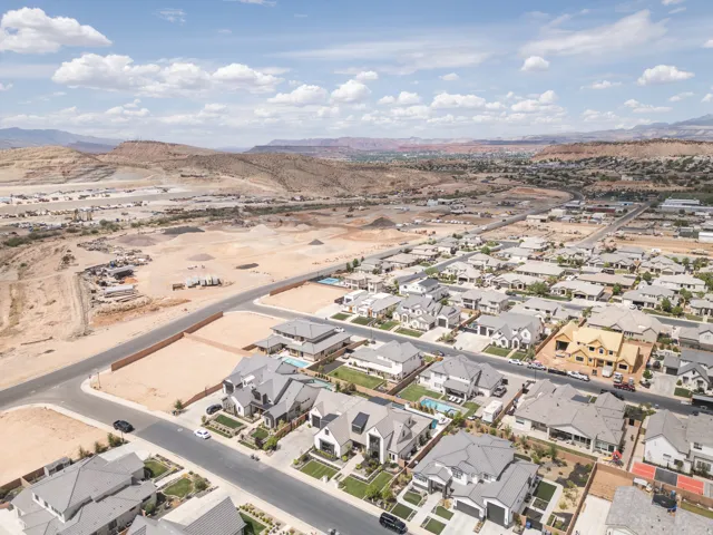 Residential neighborhood featuring modern homes with varied architectural styles and desert mountain scenery
