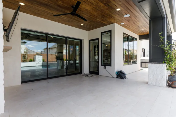 Covered patio featuring a wood-finish ceiling, recessed lighting, and a ceiling fan