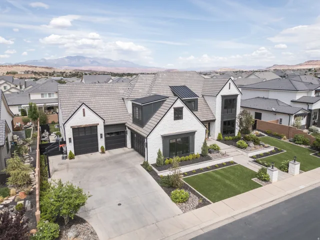 White brick exterior with dark trim accents