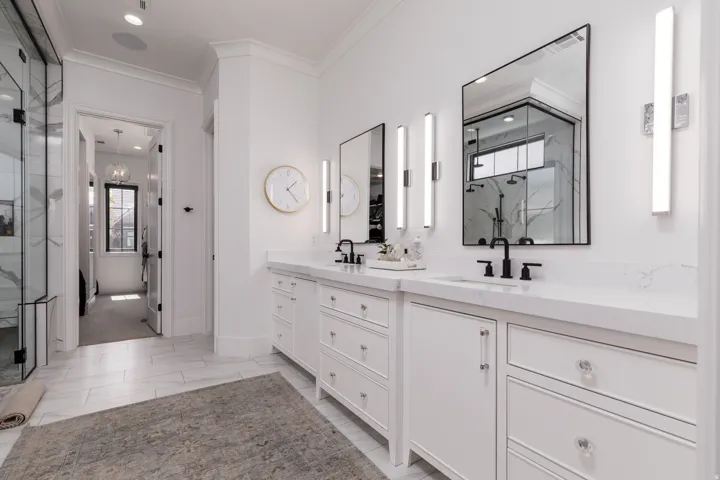 Dual vanity with undermount sinks and matte black fixtures