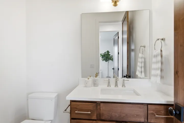 White solid surface countertop with an integrated rectangular sink