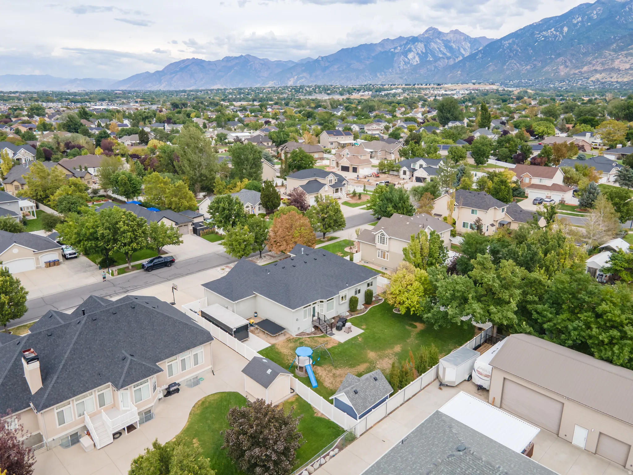 Expansive neighborhood setting with established homes and mature trees