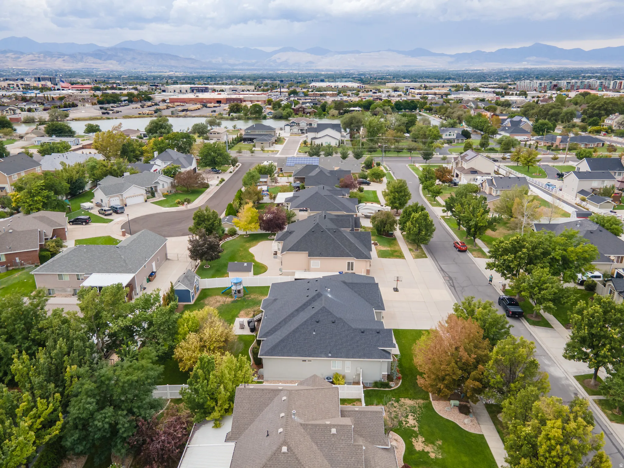 Residential neighborhood featuring detached homes and mature trees