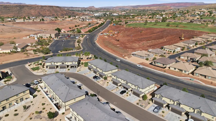 Residential development featuring townhomes and single-family residences