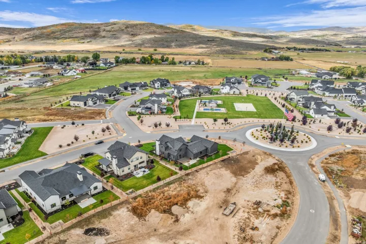 Aerial perspective of this new construction home situated on a spacious lot within an established residential community