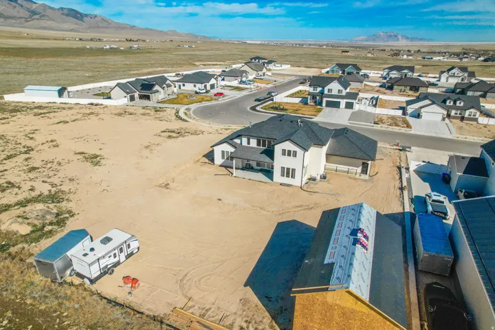 Aerial perspective highlighting a residential development with a mountain backdrop