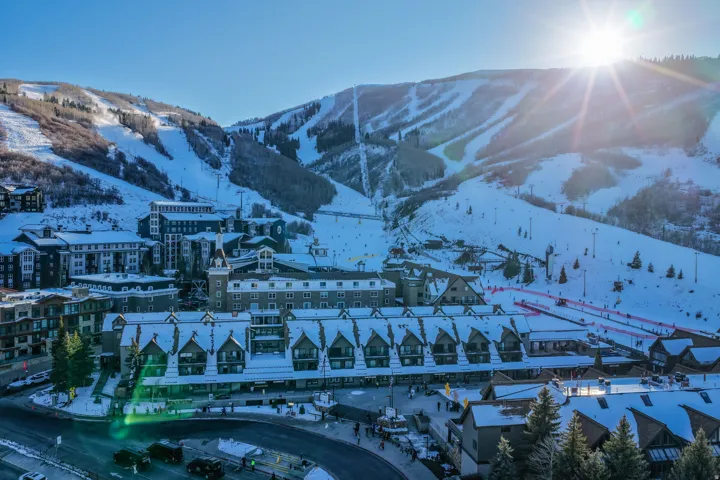 Mountainous backdrop featuring snow-covered slopes