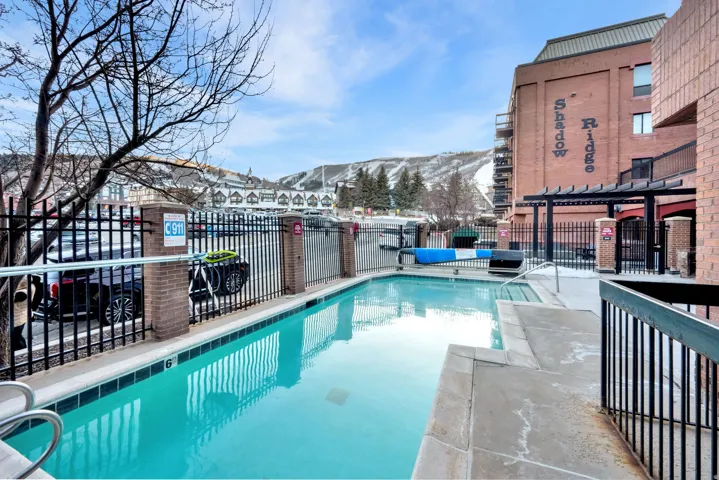 Outdoor swimming pool with concrete decking