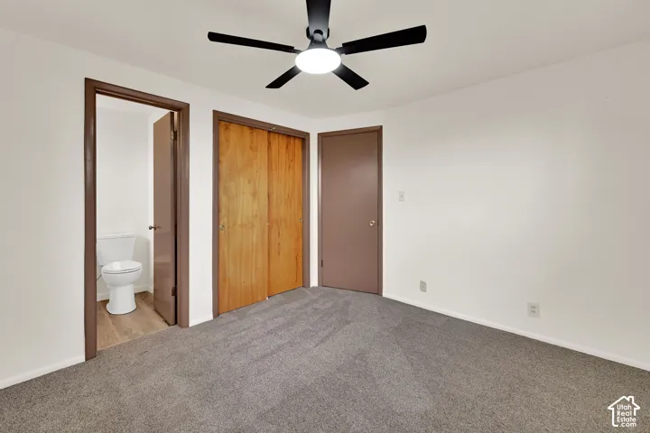 New Ceiling fan with integrated lighting, New Carpeting, wood-finish bi-fold closet doors, and light-tone wall paint