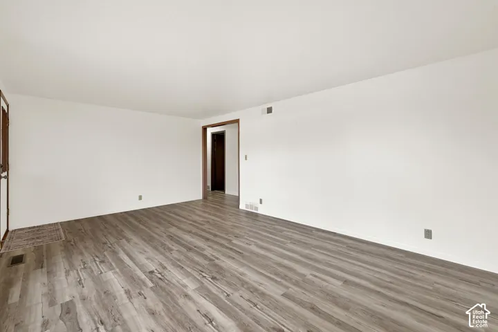 Freshly painted walls and New LVP wood flooring